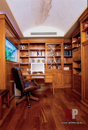 Фото интерьера библиотеки квартиры в современном стиле Фото интерьера кабинета квартиры в современном стиле