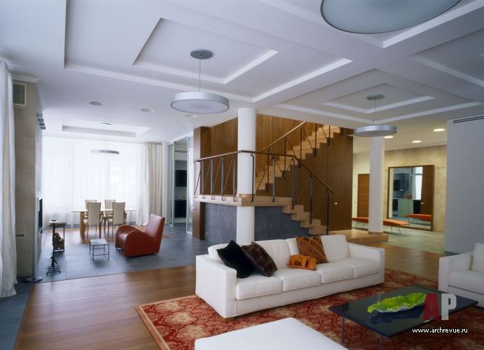 Фото интерьера гостиной двухэтажного дома в современном стиле