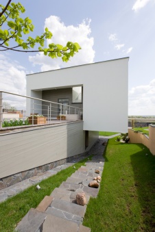 Фото фасада дома в стиле минимализм