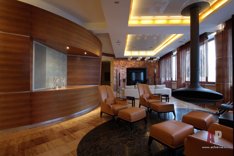 Фото интерьера каминной квартиры в современном стиле