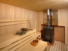Фото интерьера сауны банного комплекса загородного деревянного дома