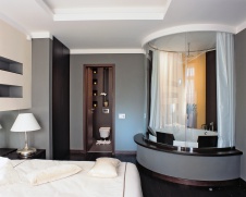 Фото интерьера спальни квартиры в современном стиле Фото интерьера санузла квартиры в современном стиле