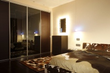 Фото интерьера спальни четырехкомнатной квартиры в стиле минимализм