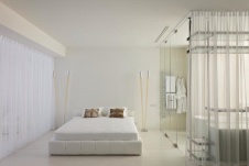 Фото интерьера спальни небольшой квартиры в стиле минимализм