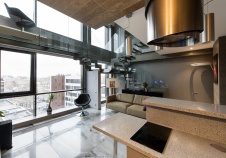 Фото интерьера кухни квартиры-студии в стиле минимализм