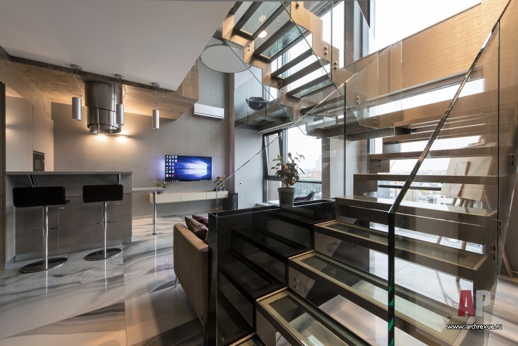Фото интерьера лестницы квартиры-студии в стиле минимализм