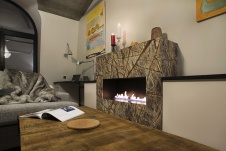 Фото интерьера каминной квартиры в стиле лофт