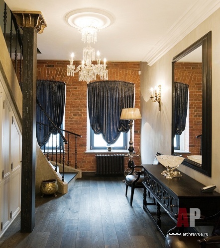 Фото интерьера входной зоны двухэтажной квартиры в стиле фьюжн