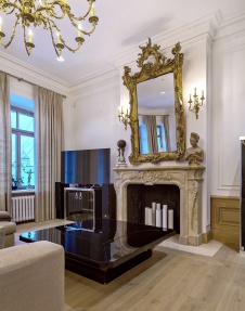 Фото интерьера каминной квартиры в стиле неоклассика