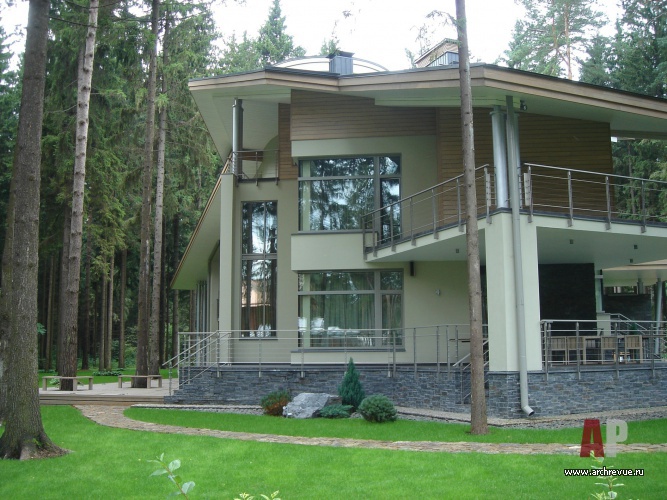Фото фасада загородного дома в стилистике современного шале