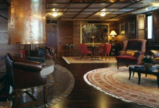 Фото интерьера каминной частного клуба в стиле фьюжн