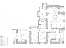 Планировка большой семейной квартиры в классической анфиладой из кухни-столовой и гостиной.