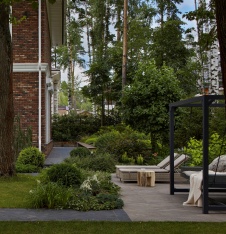 Фото фасада дома в стиле фьюжн