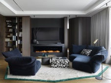 Фото интерьера гостиной квартиры в современном стиле Фото интерьера каминной квартиры в современном стиле