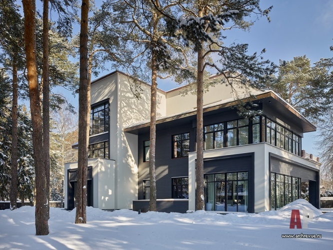 Фото фасада дома в стиле фьюжн 