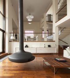 Фото интерьера каминной трехэтажного загородного дома в минимализме