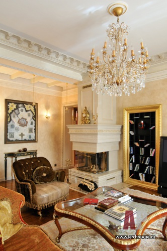 Фото интерьера каминной квартиры в классическом стиле
