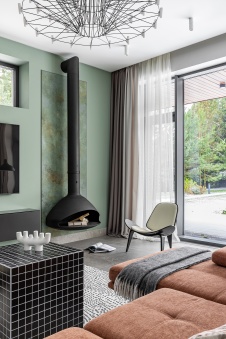 Фото интерьера каминной дома в стиле фьюжн