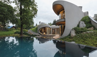 Бионический дом с зеленой кровлей 