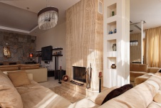 Фото интерьера каминной трехуровневого пентхауса в современном стиле