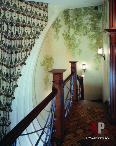 Фото интерьера лестницы дома в стиле модерн