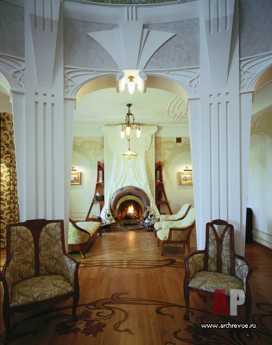 Фото интерьера каминной дома в стиле модерн