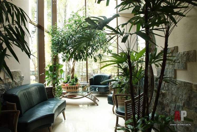 Фото интерьера зимнего сада дома в современном стиле