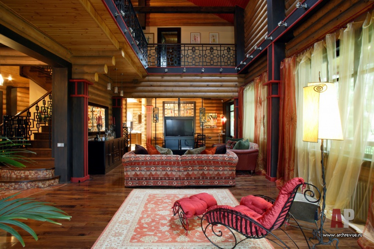 Фото интерьера гостиной деревянного дома в стиле кантри